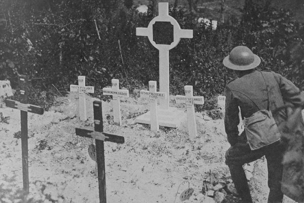 A Canadian Soldier At The Graves Of His Comrades At Vimy Ridge