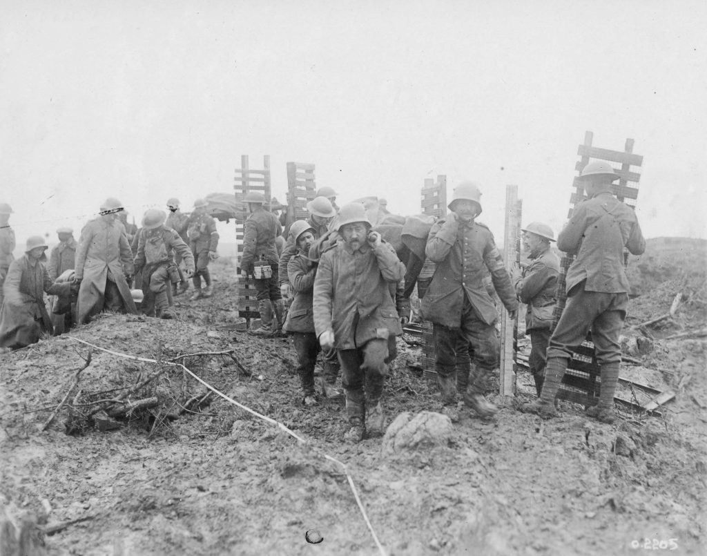 Canadian Pioneers And German Prisoners Help To Carry Wounded Canadians Away From The Front Nov 1917